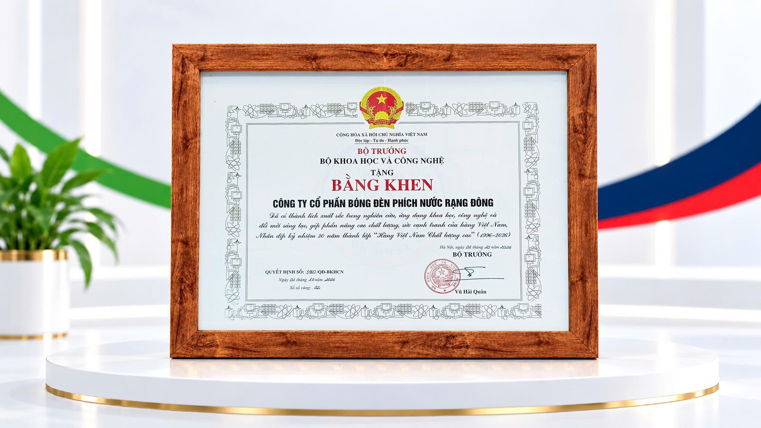 A framed certificate on a shelfDescription automatically generated
